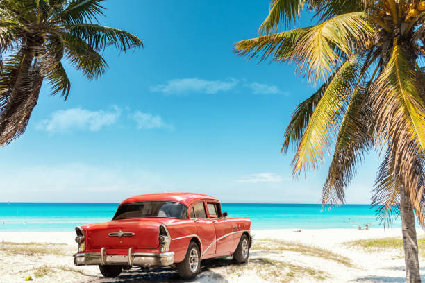 old red american car on Varadero Beach in Cuba